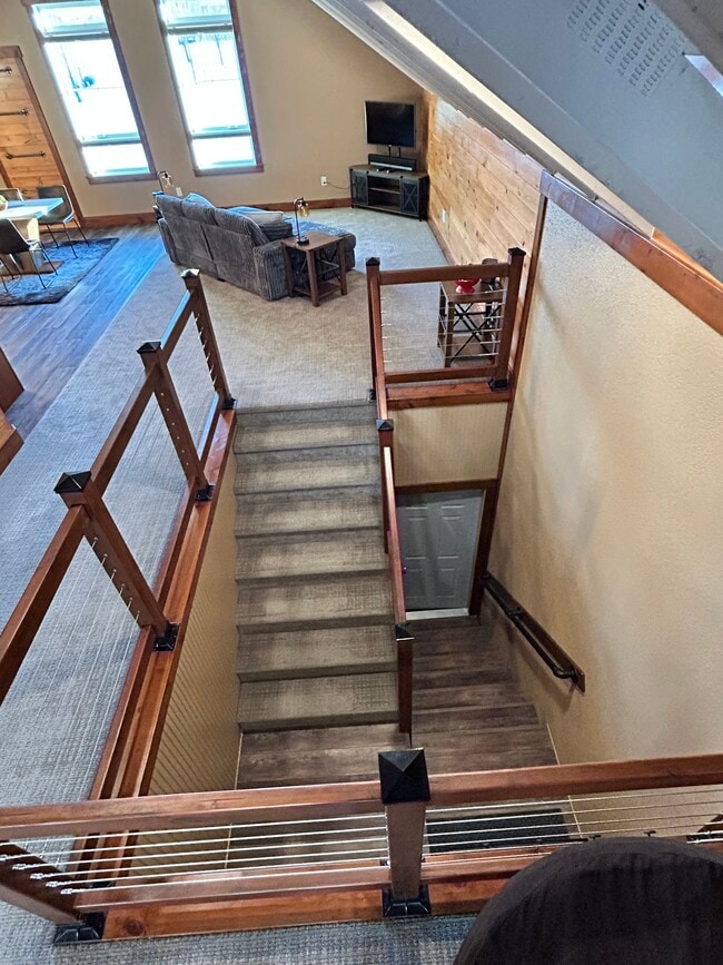 Stairs leading to loft apartment - 1216 Bay Ridge Dr