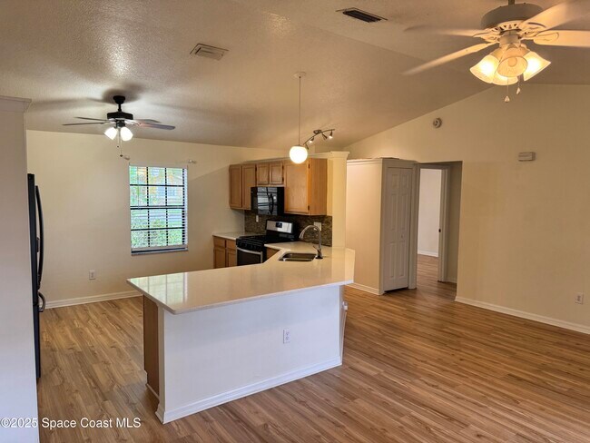 Foto del edificio - 6946 Hammock Lakes Dr