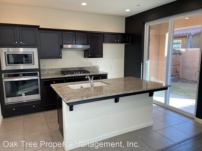 Building Photo - 3 br, 2.5 bath House - 6117 E. Brick Drive