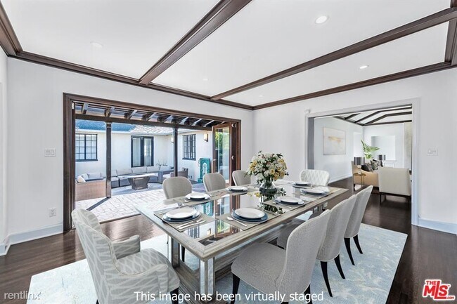 Foto del edificio - 4 br, 2.5 bath House - 11128 Montana Ave