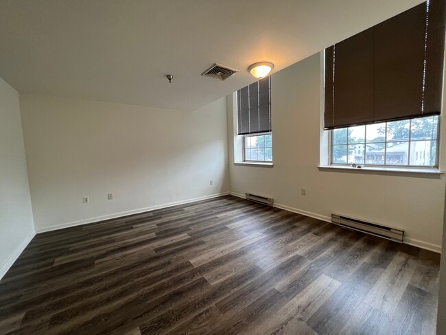 Unit 211 Living Room - Woodlayne Court Apartments
