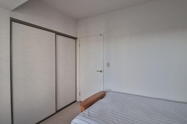 Building Photo - Two Bedrooms, Two Baths Condo Semi-furnish...