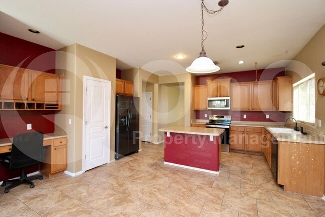 Building Photo - 15977 W Gelding Dr