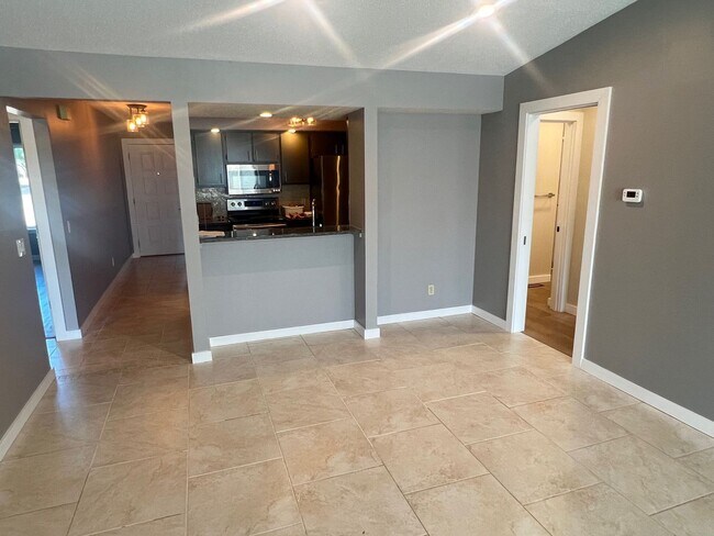 Building Photo - Updated Condo with Water view - Available ...