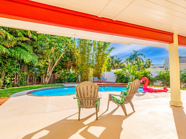 Rear Lanai overlooking pool and yard - 3250 E De Bazan Ave