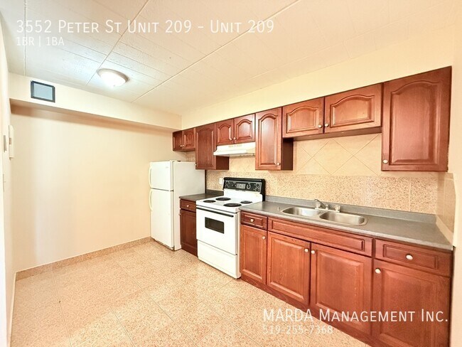 Photo du bâtiment - COZY 1 BED/1BATH APT W/ BALCONY - WESTEND! INCLUSIVE!