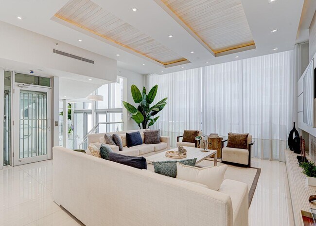 Building Photo - 9501 Collins Ave