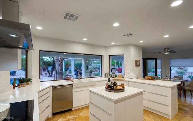 Building Photo - 4 br, 3 bath House - 8260 E Sutton Dr