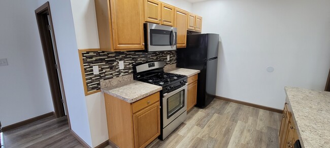 New appliances: stove, refrigerator, dishwasher - 1102 Kenmore Ave
