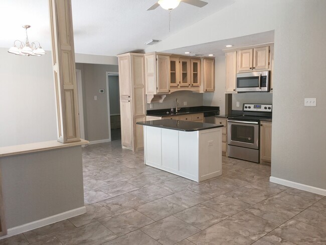 Building Photo - 6608 Pebble Spring Dr