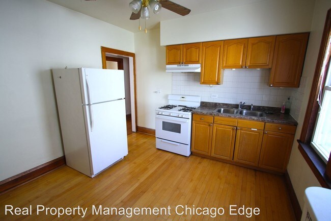 Foto del edificio - 3359 N Laramie Ave