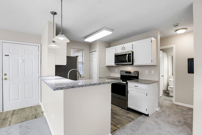 Kitchen with stainless steel appliances - 903 Wentworth Ct