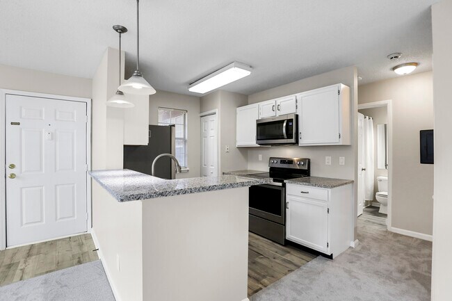 Kitchen with stainless steel appliances - 903 Wentworth Ct Apartment