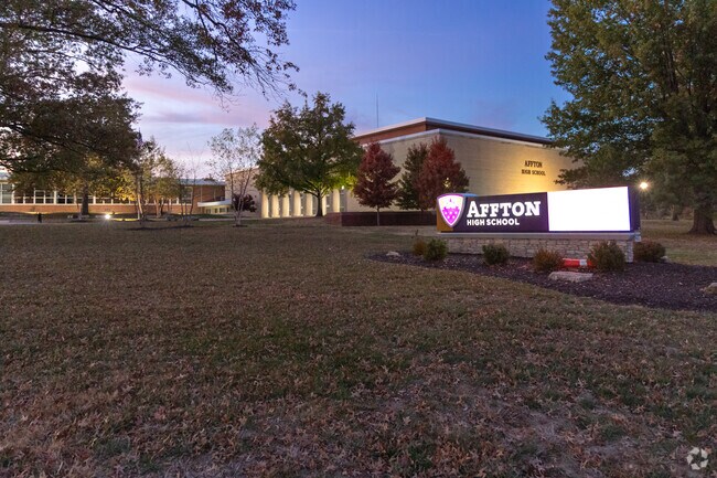 Affton High School has a large campus with mature trees.