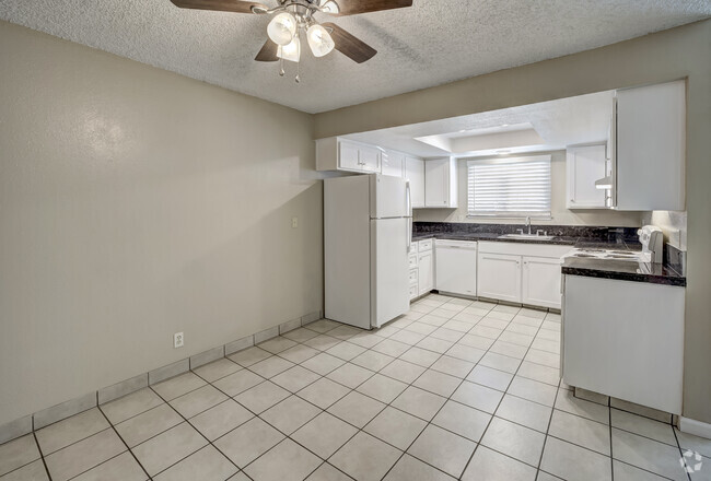 2Bd. 1Ba. 875 Sq. Ft. - Dining Room and Kitchen - Campus Court Apartments