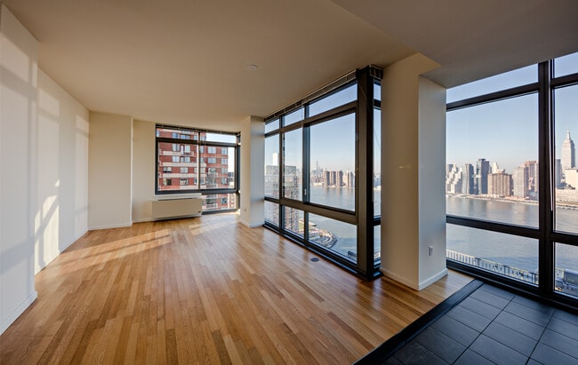Classic Package III dining and living room with parquet or hard-surface flooring - Avalon Riverview