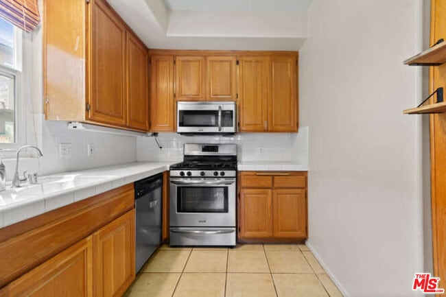 Building Photo - 10790 Rose Ave