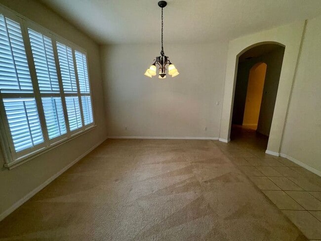 Foto del edificio - 4 Bedroom 3 bath Vista Lakes Home with a Fenced Backyard!