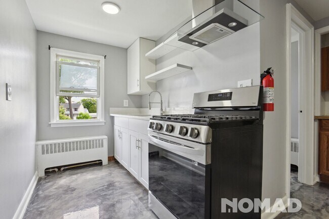 Foto del edificio - Stunning Newly Renovated 2-Bedroom Apartme...