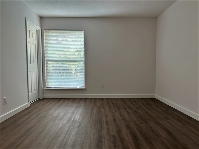 Vinyl flooring in the master bedroom - Wildwoods Of Lake Johnson