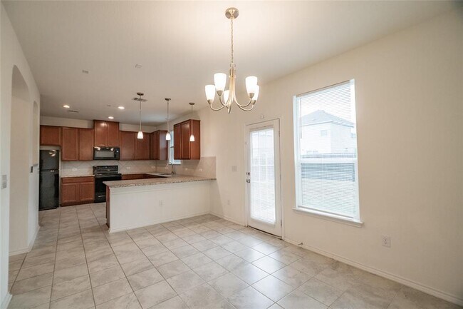 Foto del edificio - 6412 Carriage Pines Dr