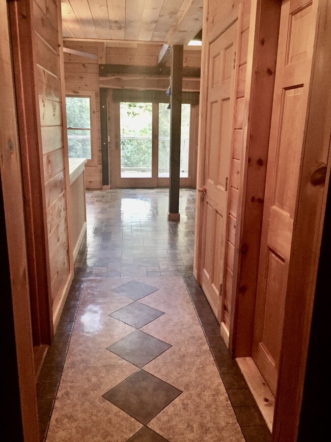Main floor hallway from entry room into great room - 192 Lake Oglethorpe Dr