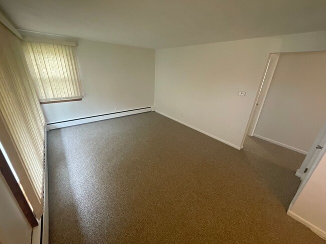 Building Photo - Charming 3-Bedroom Home with Backyard & Of...