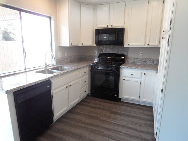 Photo - Two Story 4 BR 2.5 BA Condo With 2 Car Garage