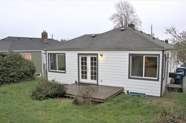 back yard and deck belong exclusively to the back unit (4222). - 4222 4th Ave NW