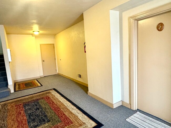 Entry to building- Apt. 2 door on right; door in front is laundry area. - 7100 Thomas Blvd