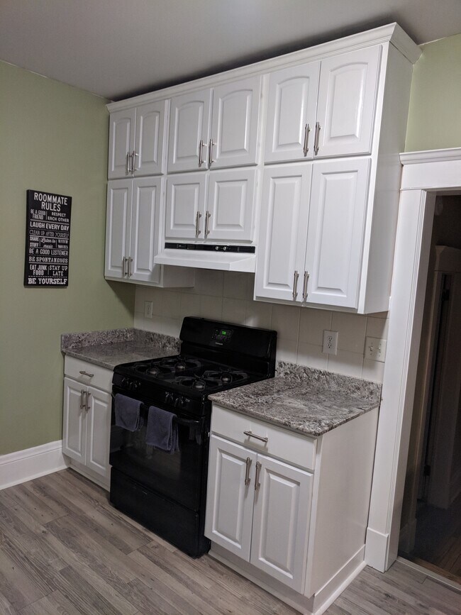 Stove and granite countertops - 2109 Girard Ave S