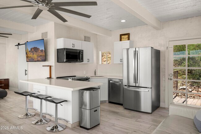 Foto del edificio - 6900 N Highlands Dr