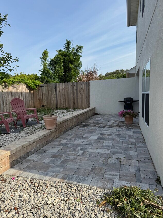 New pavers backyard porch - 64 Atlantic Oaks Cir