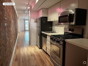 Building Photo - 208 E 78th St