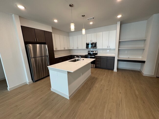 Stainless Steel Appliances and Quart Counters - 3Twenty at the Vybe