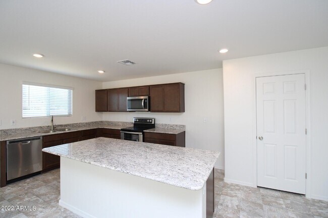 Building Photo - 1517 E Desert Breeze Dr