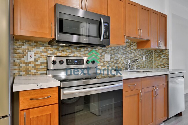 Foto del edificio - "Charming 1-Bedroom Condo in the Heart of Bellevue – Perfectly Cozy 422 Sq Ft Space!"