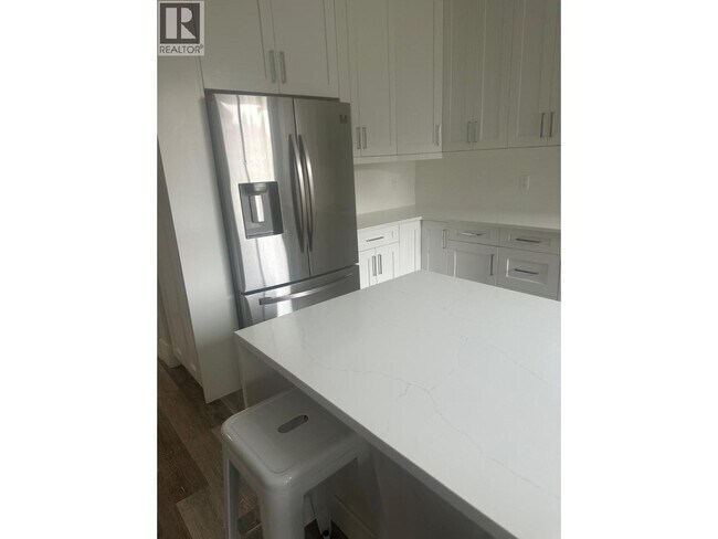 Photo du bâtiment - 8128 Heather St