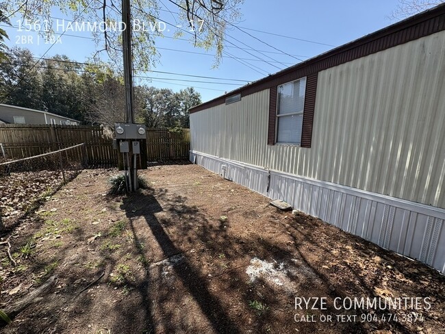 Building Photo - Huge Deck - Spacious Home - Fenced in Yard