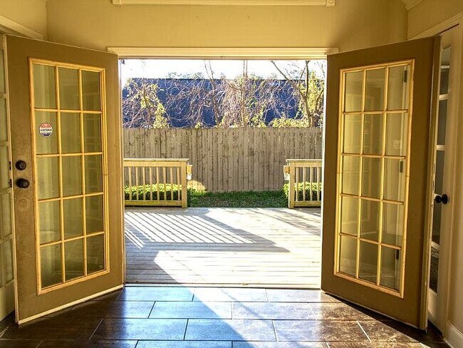 Enjoy outdoors on the beautiful deck, perfect for entertaining! - 2220 Lenox Rd NE