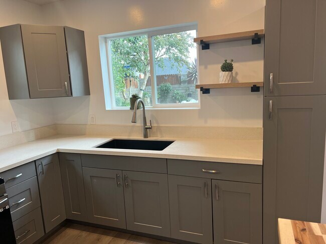 Spacious kitchen with beautiful view of backyard - 9300 Benson Way