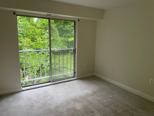 2nd BR features juliet balcony with sliding glass doors. - 3240 Hewitt Ave