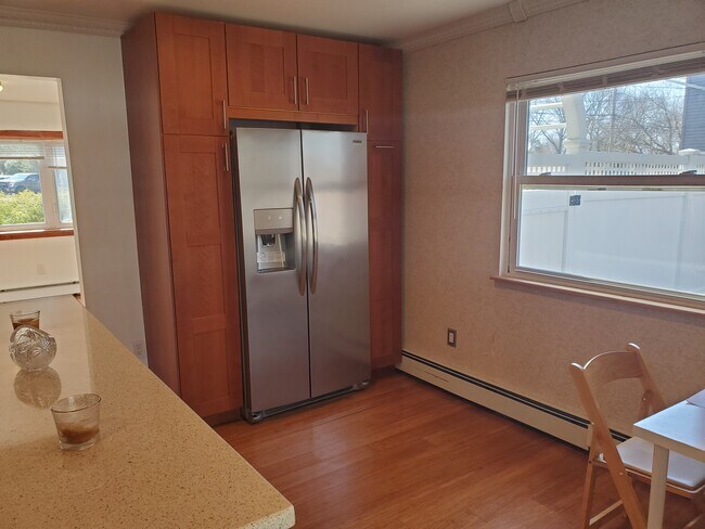 Two door fridge with plenty of cabinet space. - 627 Hawkins Rd