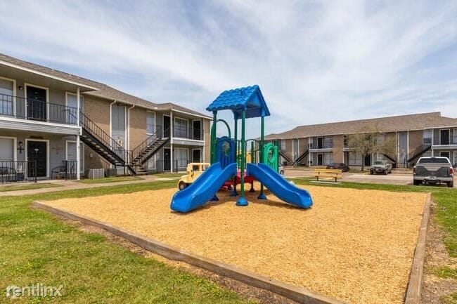 Building Photo - 2 br, 1 bath Condo - 1010 Magnolia St Flat...