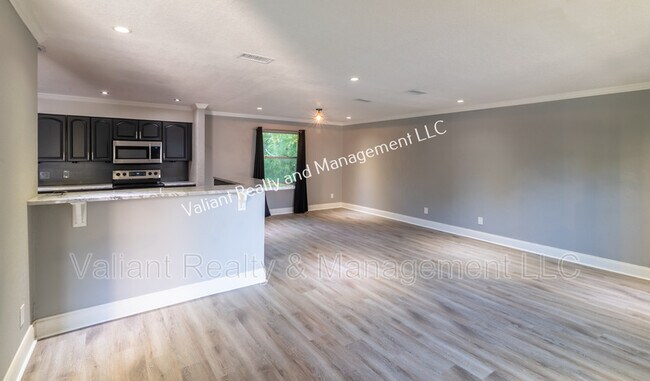 Foto del edificio - 5147 River Bluff Ln