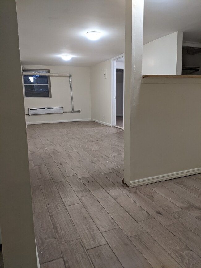 View from dining area into living room - 68 Hamilton Ave