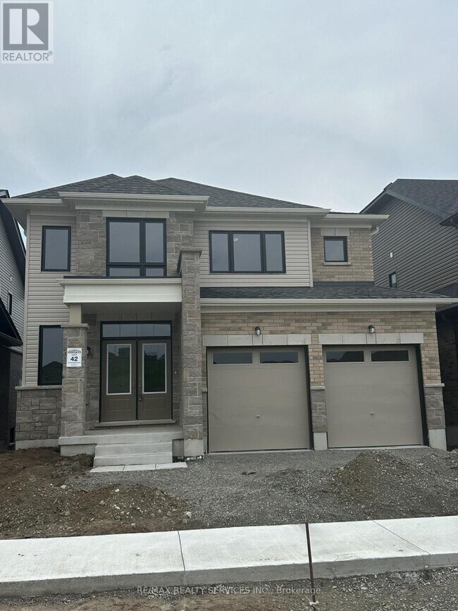 Photo du bâtiment - 136 Thicketwood Ave