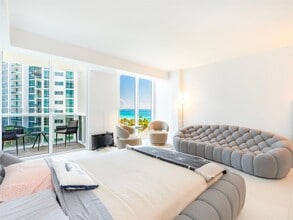 Building Photo - 10275 Collins Ave
