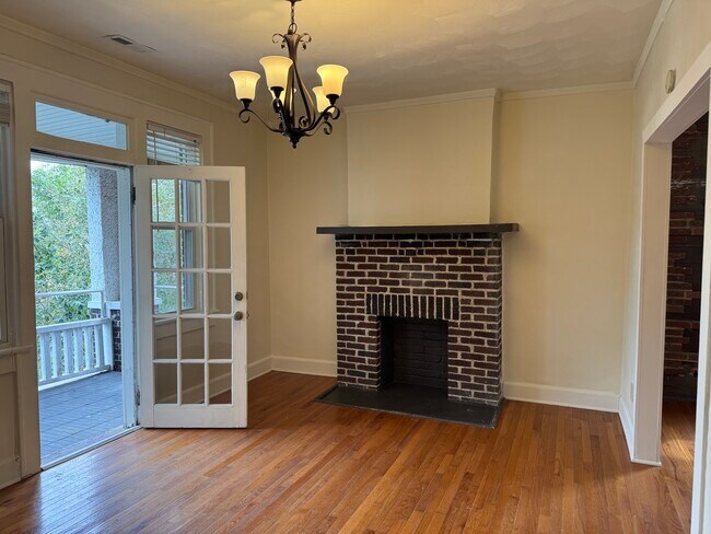 Living Room with opening to Patio/Balcony - 535 W 36th St