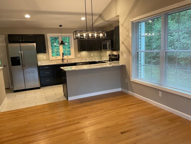 Kitchen with granite and stainless appliances - 32 Dry Hill Rd